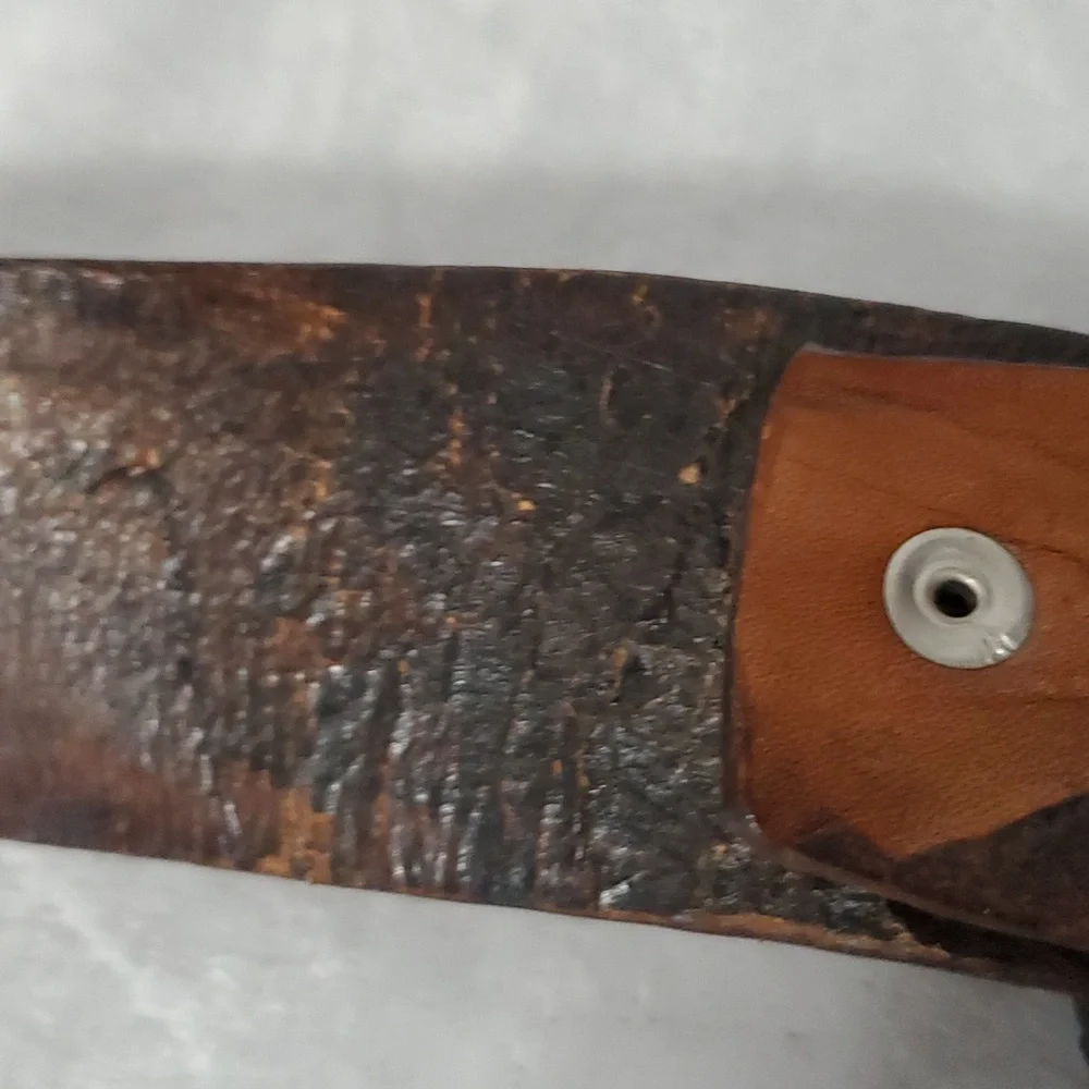 Vintage Leather Belt With Eagle Buckle and Details Embossed Along the Strap.